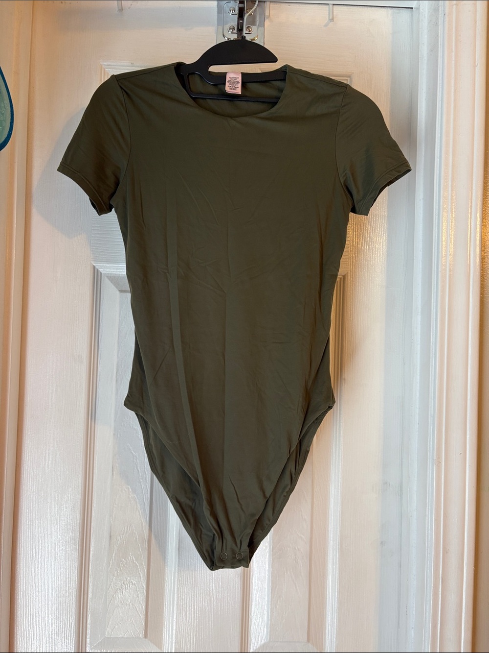 NWOT Victoria Secret body suit size small in Olive.